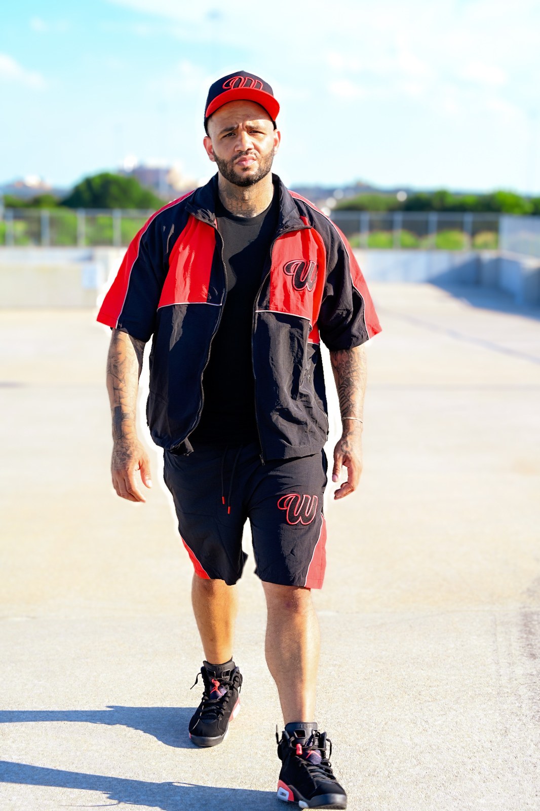 We Hate Haters Club (Black/Red) Suede Winners Trucker Hat